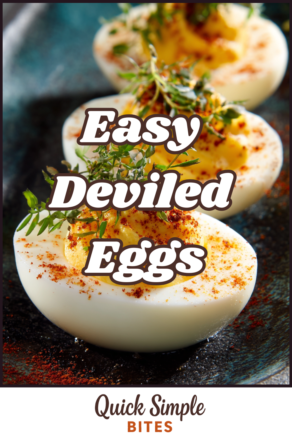 Three Deviled Eggs halves garnished with paprika and fresh herbs are shown on a dark plate. Text over the image reads “Easy Deviled Eggs.”.